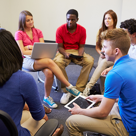 Group Of Teens Sharing Thoughts